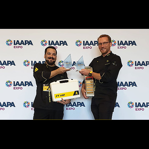 Sascha Geib, COO & Corporate Chef VITO Fryfilter (on the left) and Andreas Schmidt, CEO VITO AG (on the right), receive the IAAPA Brass Ring Awards